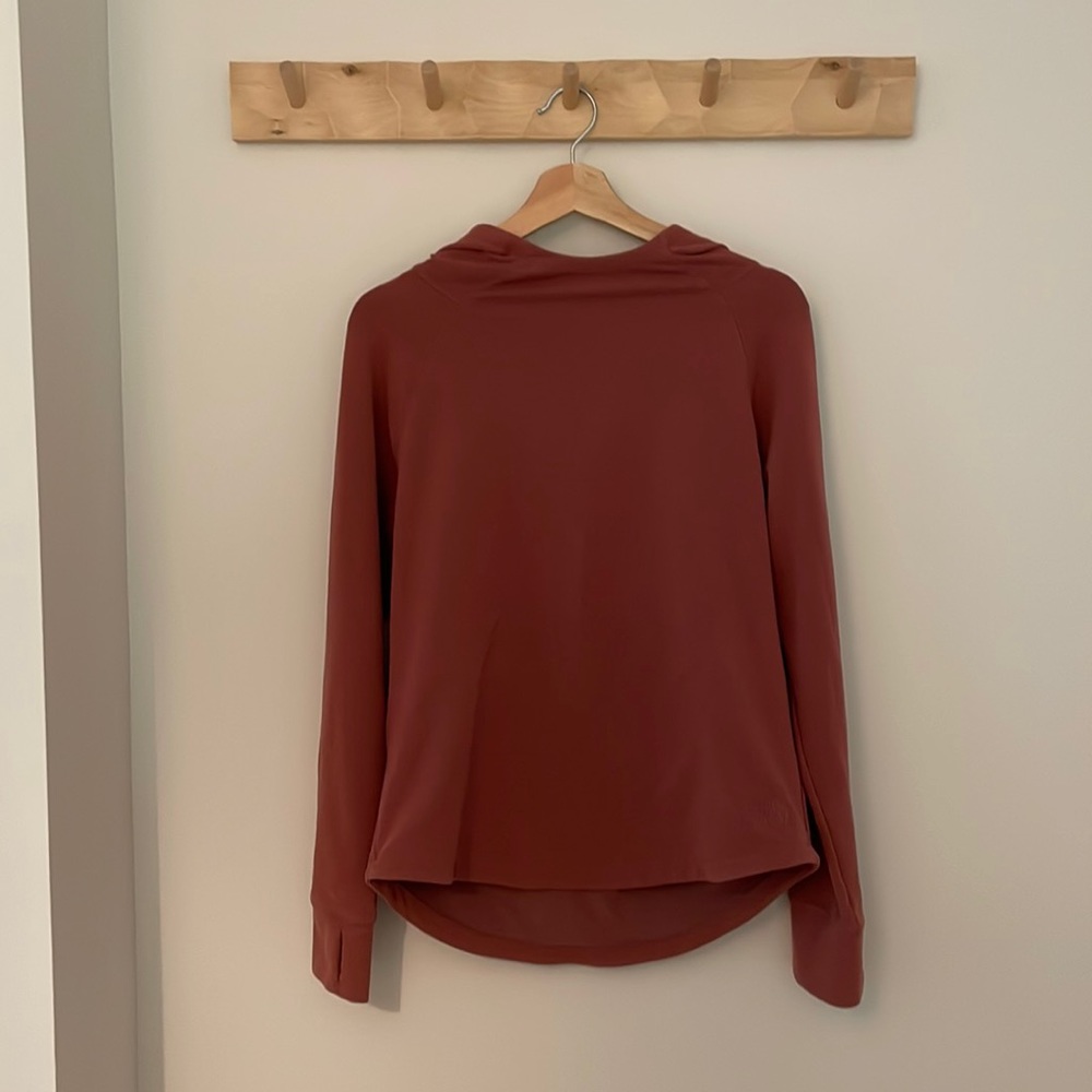 Women’s Northface size medium flashdry hoodie in a burnt red